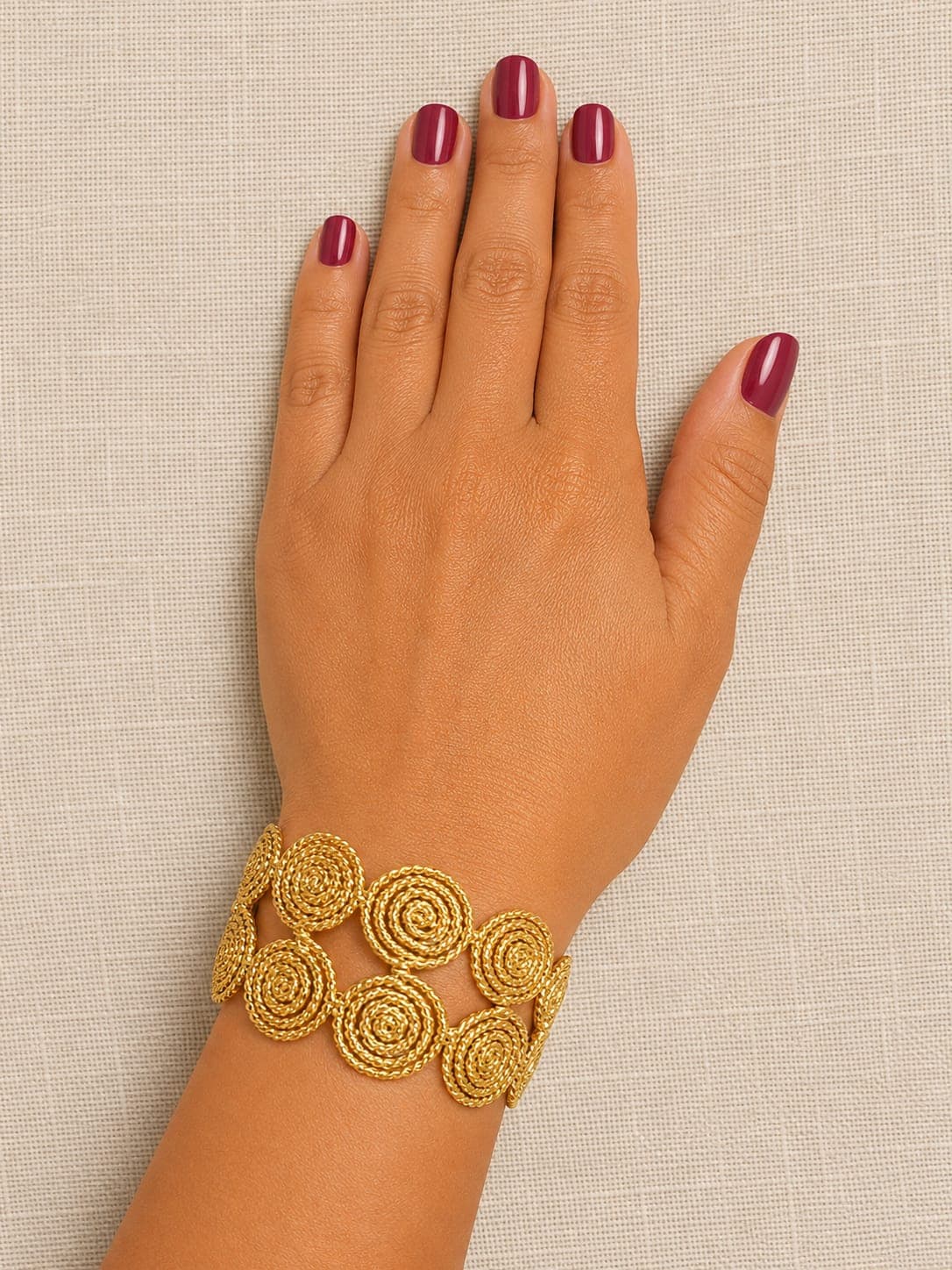 BRAZALETE ESPIRAL DORADO